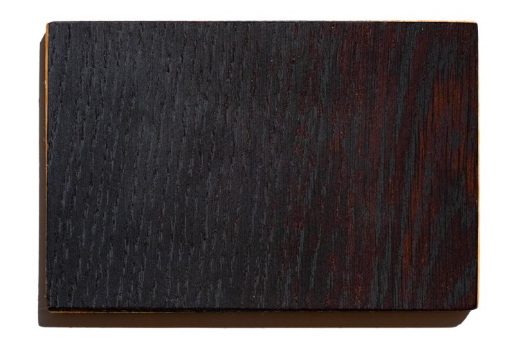 abonos is a fossil wood and is one of the finish of the sandyshapes snowboards, with a black and red/brown color